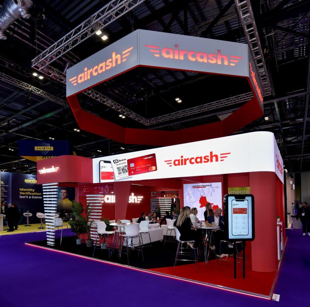 large bespoke exhibition stand with a hexagonal banner